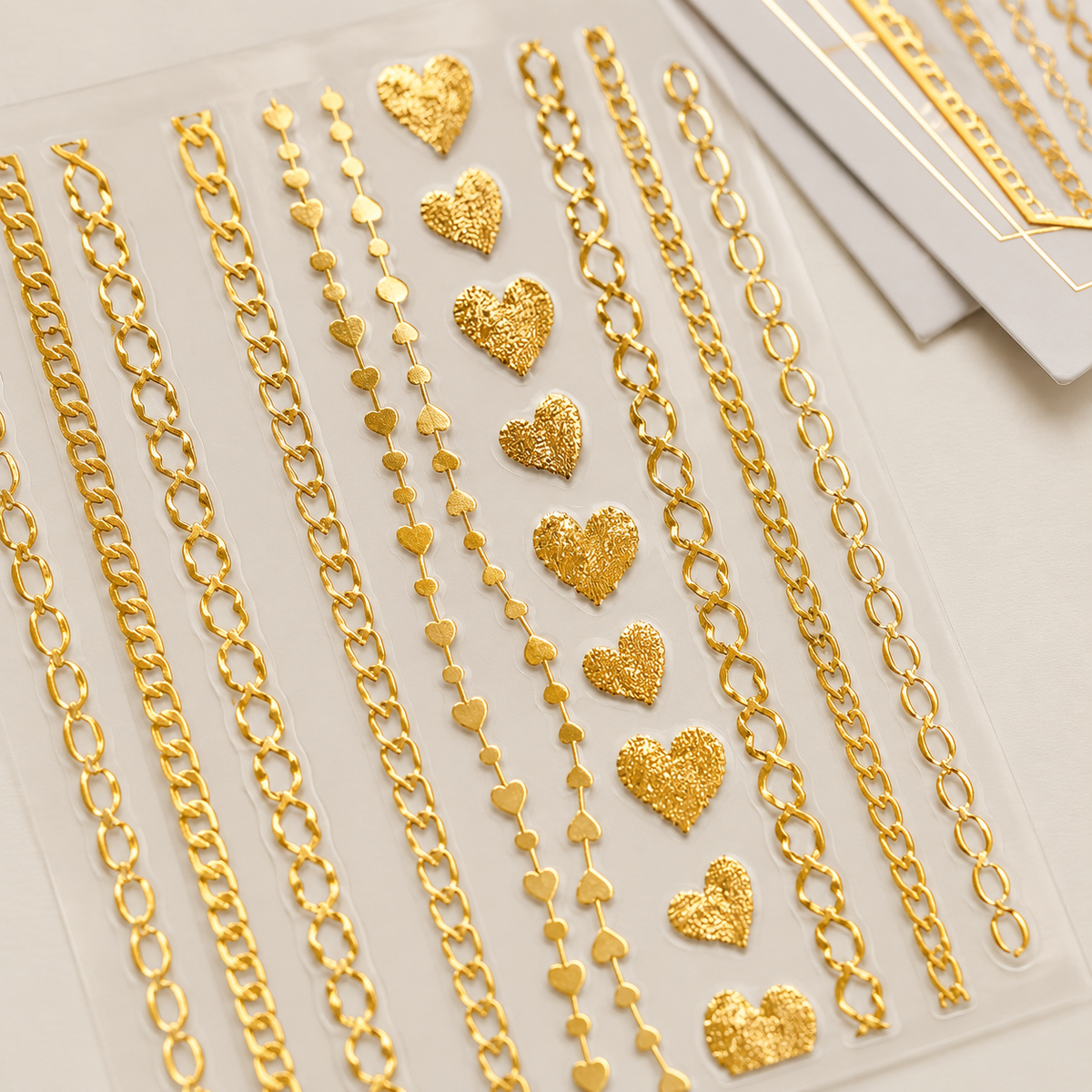 Nail Art Professional Stickers DP344 – Cadenas y Corazones Dorados